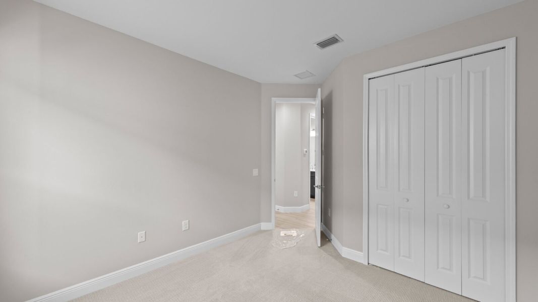 Spacious, unfurnished interior of a new home in SkySail, Naples (Image 24).