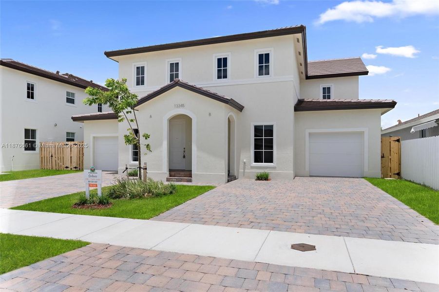 Front exterior of a new home in , Miami, FL, highlighting curb appeal (Image 2).
