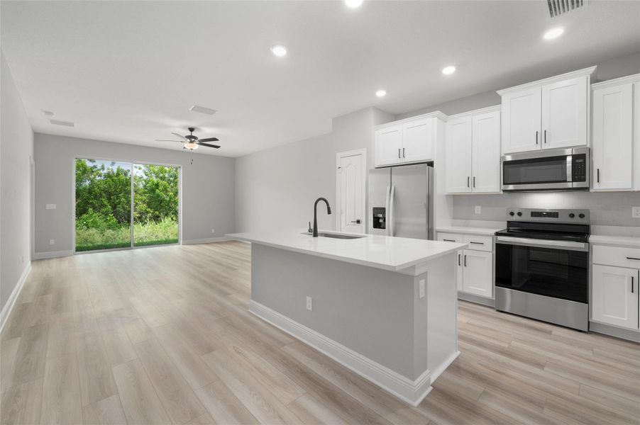 Furnished interior view inside a new home in Celebration Pointe, Fort Pierce (Image 5). Furnished interior view inside a new home in Celebration Pointe, Fort Pierce (Image 5).