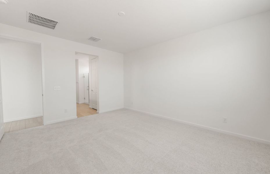 Spacious, unfurnished interior of a new home in Soleo, San Tan Valley (Image 26).