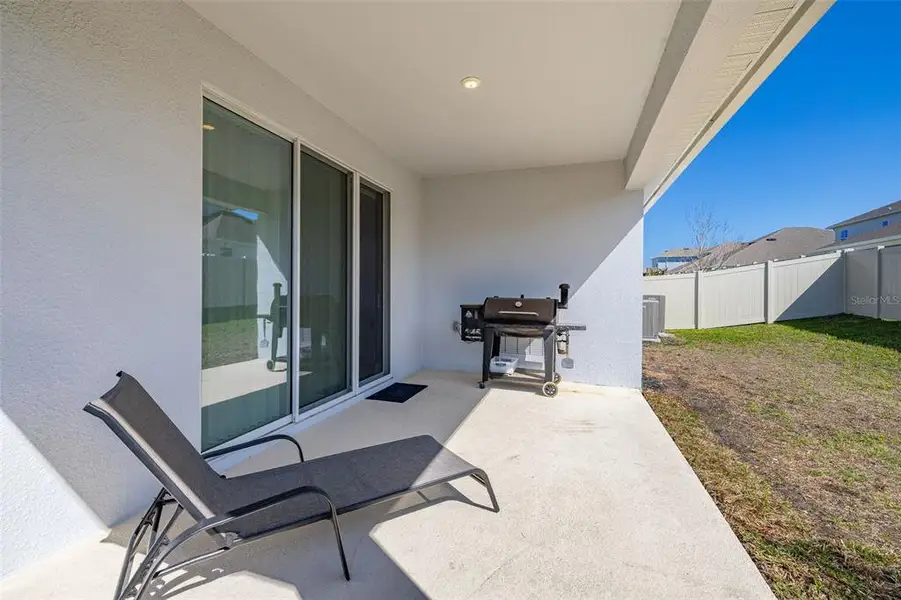 Exterior details and patio area of a home in Hartwood Landing, Clermont (Image 32).