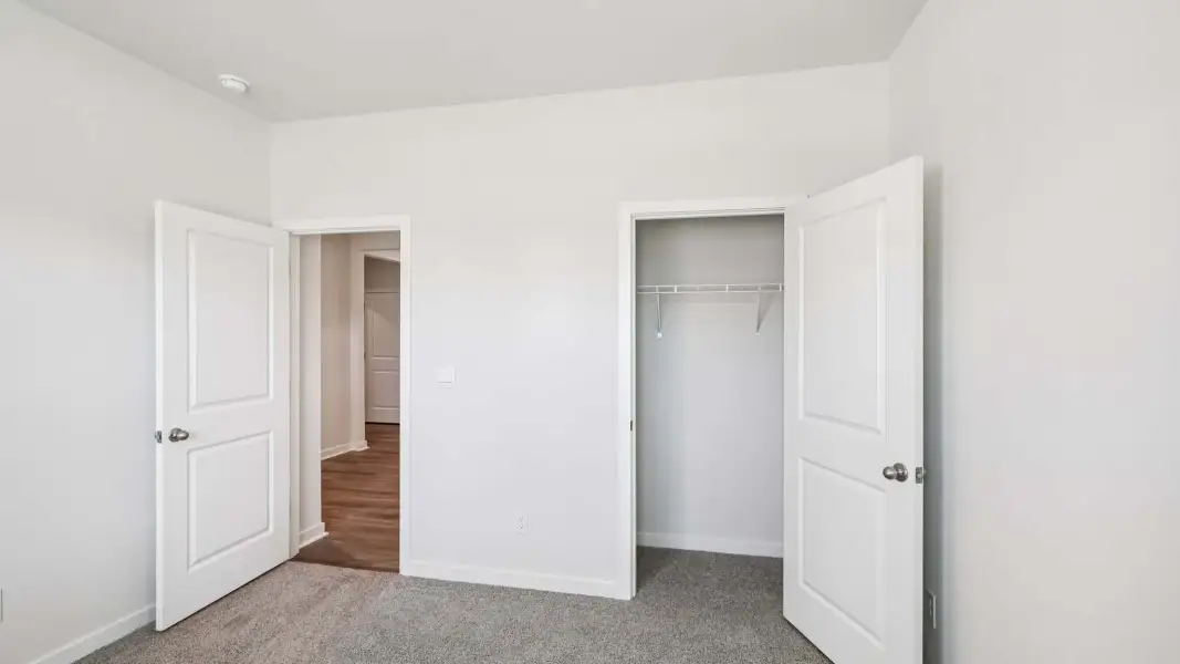 Representative unfurnished interior of a home built from the Aria by D.R. Horton in Sweetwater Village, Rockwell (Image 17).