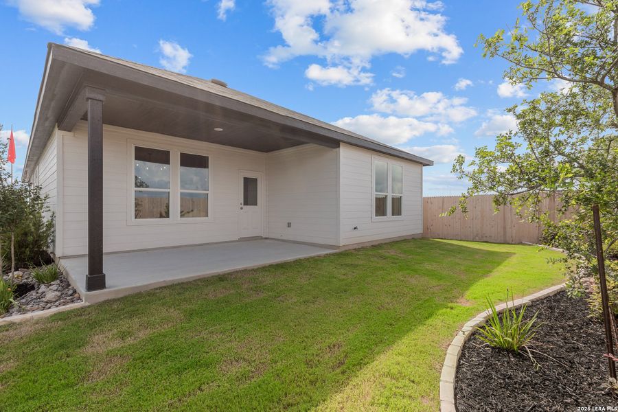 Exterior details and patio area of a home in Dove Song, Marion (Image 3).