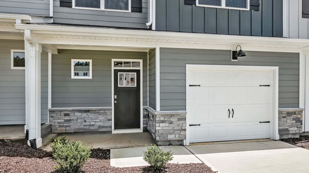 Representative exterior photo of a completed home built from the DANIEL by D.R. Horton in The Townes Park, Apex, NC (Image 19). Representative exterior photo of a completed home built from the DANIEL by D.R. Horton in The Townes Park, Apex, NC (Image 19).
