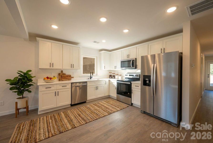 Furnished interior view inside a new home in , Statesville (Image 6).