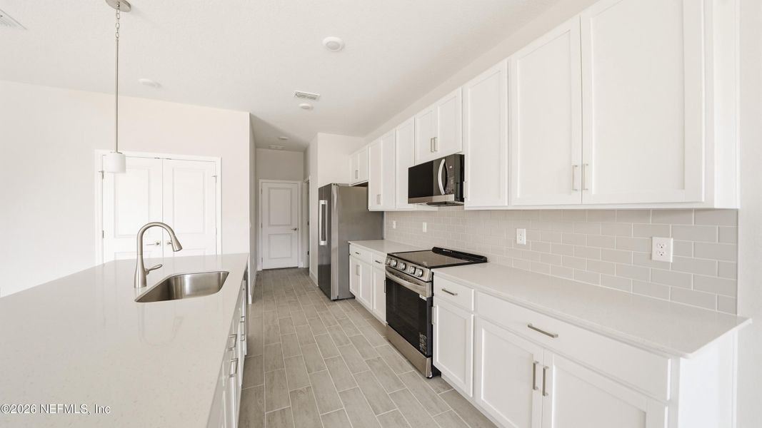 Furnished interior view inside a new home in , Palm Coast (Image 9).