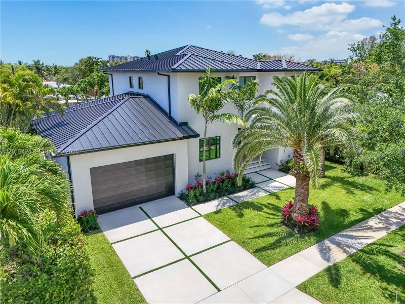 Front exterior of a new home in , North Miami, FL, highlighting curb appeal (Image 25).