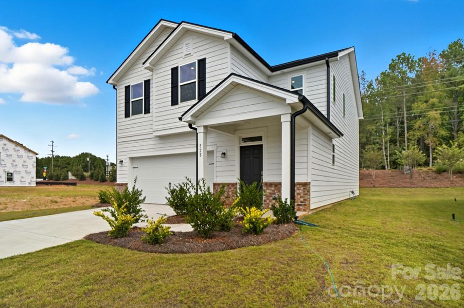 Front exterior of a new home in Bellina, York, SC, highlighting curb appeal (Image 19).