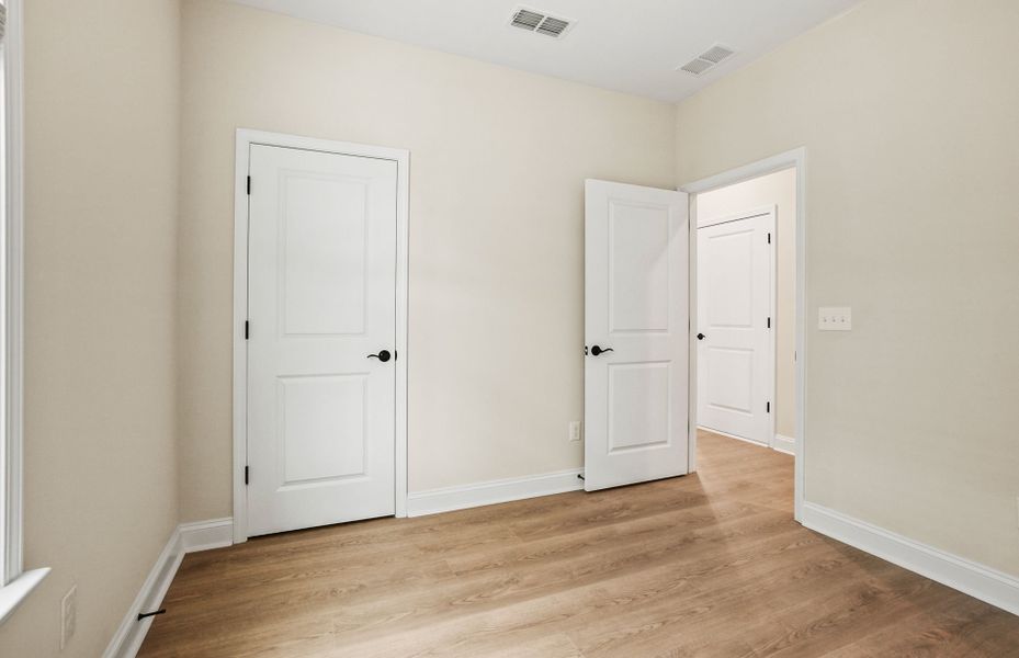 Spacious, unfurnished interior of a new home in Carolina Riverside, Belmont (Image 32).