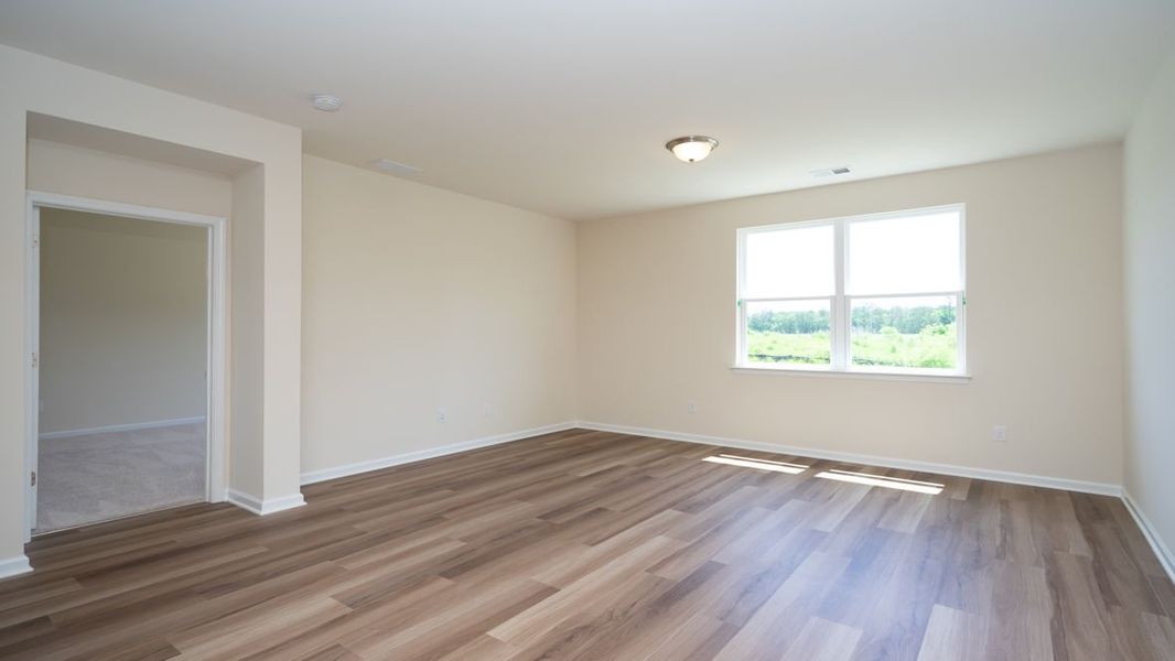 Representative unfurnished interior of a home built from the CALI by D.R. Horton in Lochaven, Conway (Image 29).