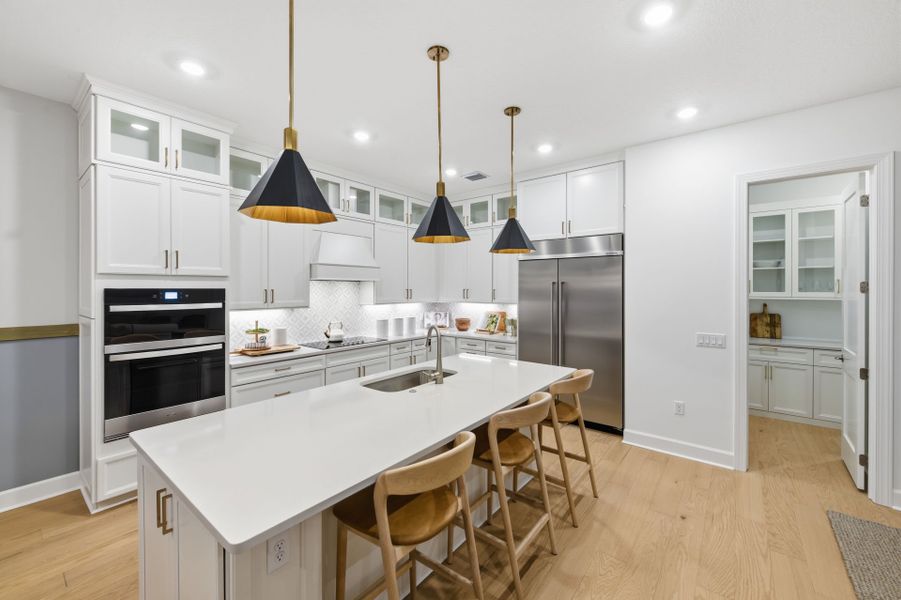 Representative furnished interior of a home built from the Scarlett by DiVosta in The Reserve at Eastpointe, Palm Beach Gardens (Image 28).