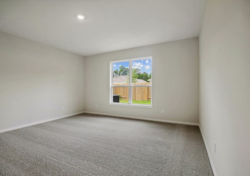Master bedroom with lush carpet