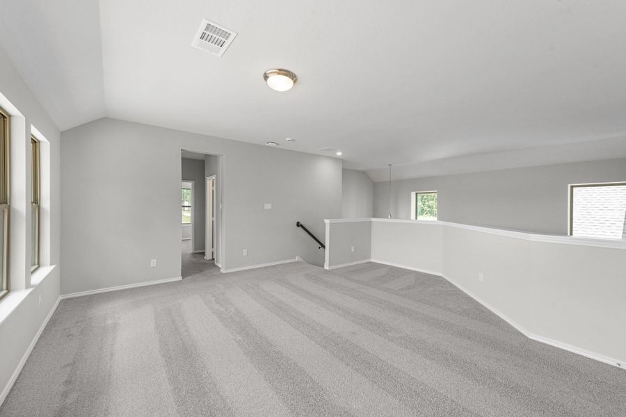 Additional view of the upstairs gameroom.