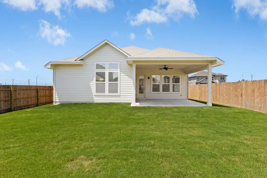 Exterior details and patio area of a home in University Heights, Round Rock (Image 4).