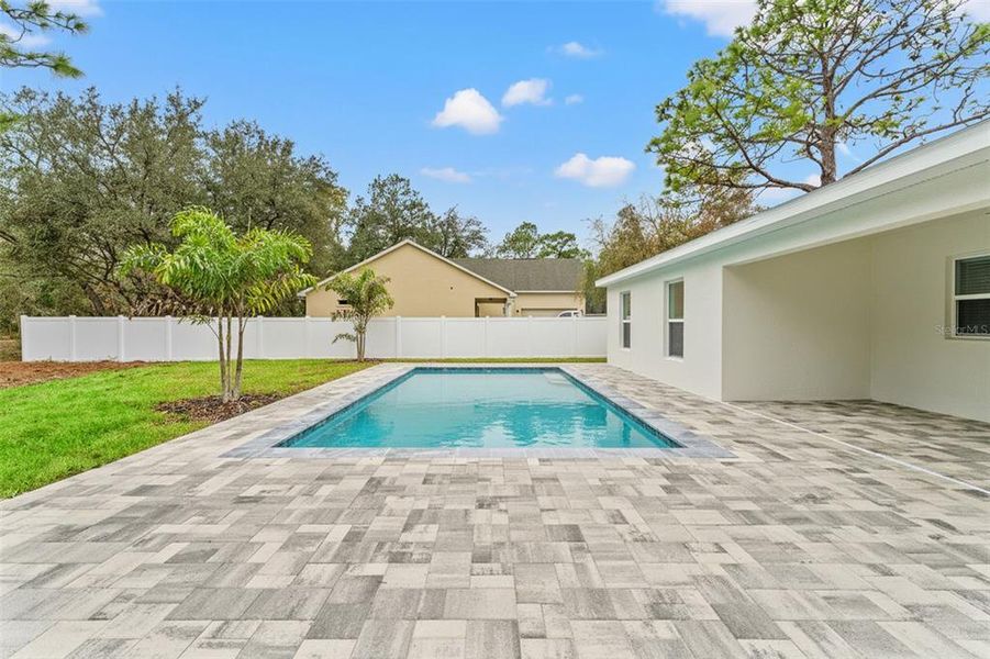 Exterior details and patio area of a home in , Brooksville (Image 36). Exterior details and patio area of a home in , Brooksville (Image 36).