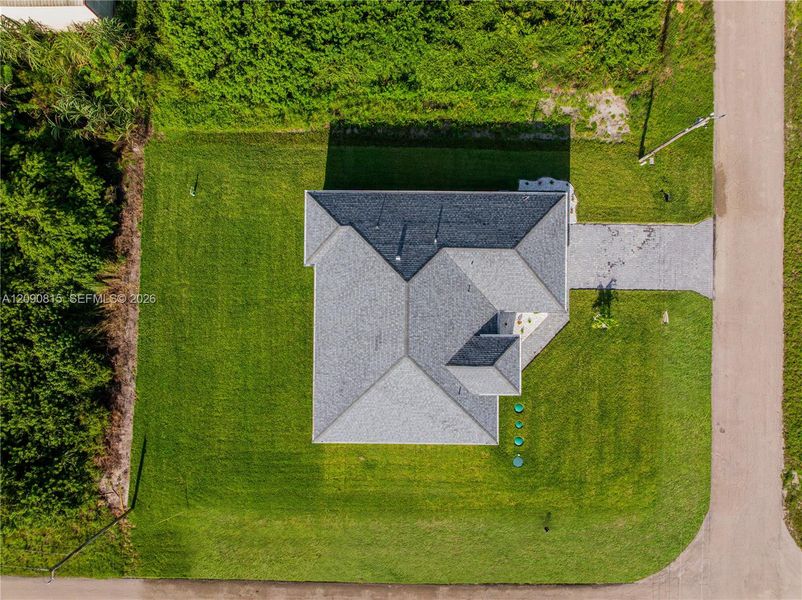 Front exterior of a new home in , Lehigh Acres, FL, highlighting curb appeal (Image 26).