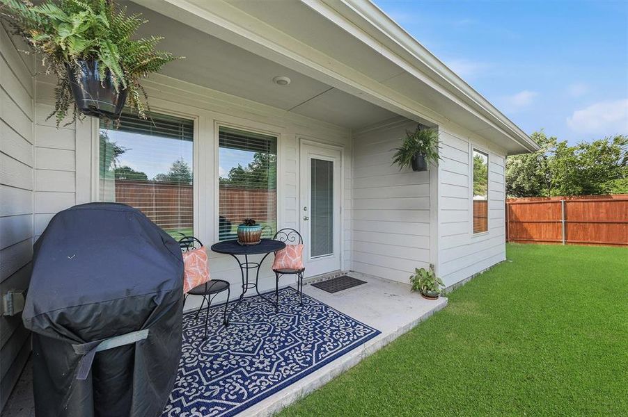 Exterior details and patio area of a home in Three Oaks, Sherman (Image 4).