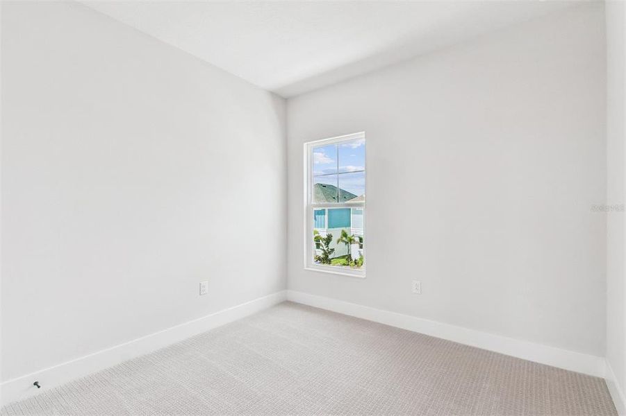Spacious, unfurnished interior of a new home in Emerald Landing at Waterside at Lakewood Ranch – Cottage Series, Sarasota (Image 30).