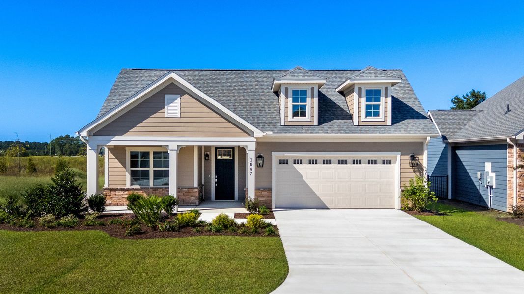 Representative exterior photo of a completed home built from the Promenade III by Epcon Communities in Courtyards by Carrell, Ocean Isle Beach, NC (Image 30). Representative exterior photo of a completed home built from the Promenade III by Epcon Communities in Courtyards by Carrell, Ocean Isle Beach, NC (Image 30).