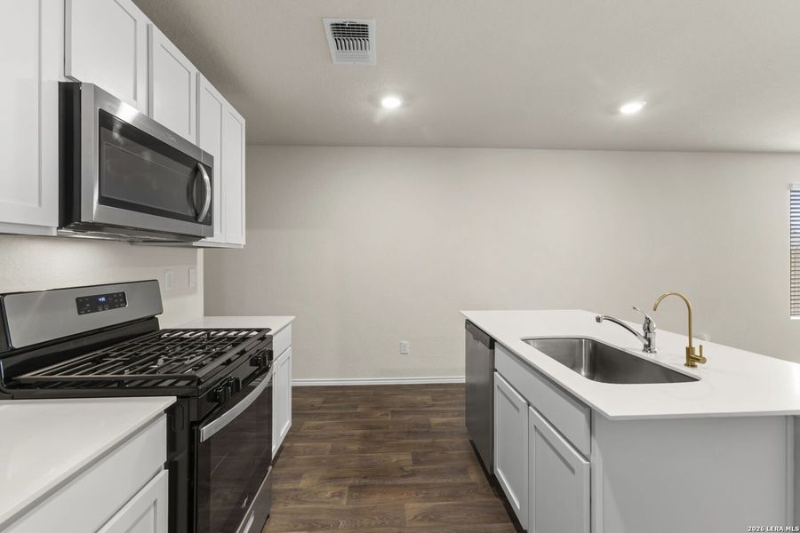 Furnished interior view inside a new home in Redbird Ranch, San Antonio (Image 9).