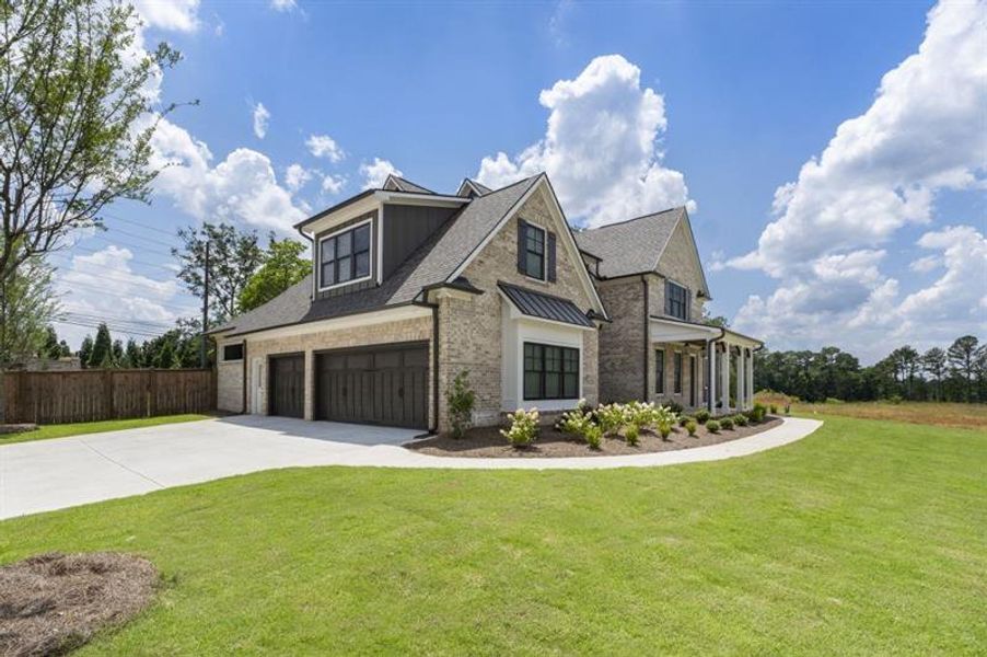 Front exterior of a new home in , Marietta, GA, highlighting curb appeal (Image 22). Front exterior of a new home in , Marietta, GA, highlighting curb appeal (Image 22).