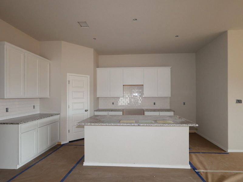 In-progress construction of a new home in Carillon, Manor, TX (Image 14).