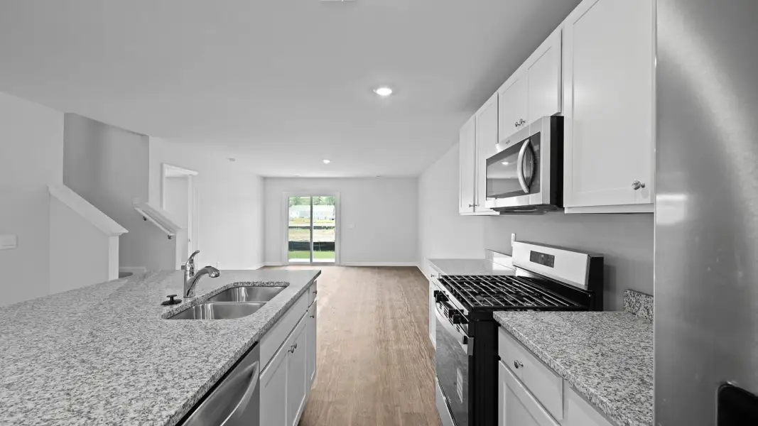 Furnished interior view inside a new home in Pine Hills Townhomes at Cane Bay, Summerville (Image 6). Furnished interior view inside a new home in Pine Hills Townhomes at Cane Bay, Summerville (Image 6).