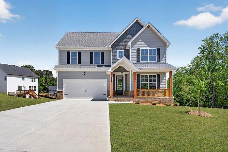 Front exterior of a new home in Austin Ridge, Commerce, GA, highlighting curb appeal (Image 2). Front exterior of a new home in Austin Ridge, Commerce, GA, highlighting curb appeal (Image 2).
