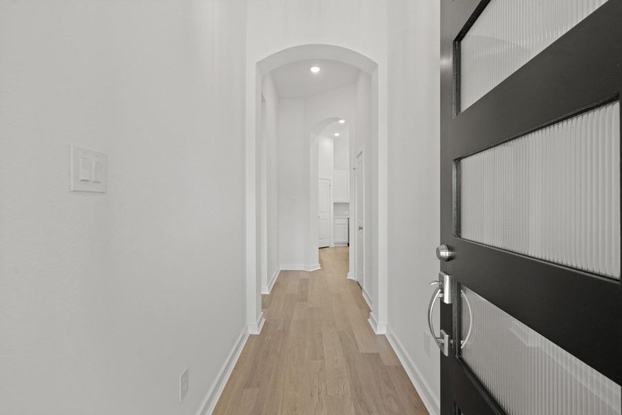 Spacious, unfurnished interior of a new home in Sunterra, Katy (Image 16).