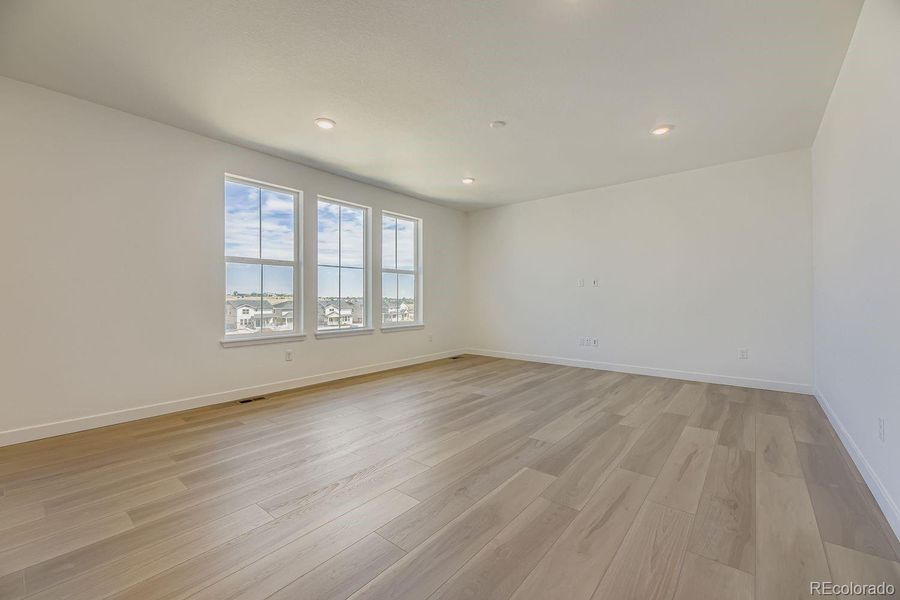 Spacious, unfurnished interior of a new home in Ken-Caryl Ranch: The Monarch Collection, Littleton (Image 13).