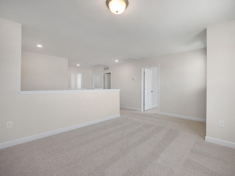 Spacious, unfurnished interior of a new home in Retreat at North Main, Lillington (Image 19).