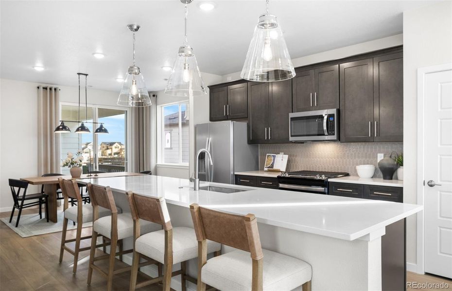 Furnished interior view inside a new home in Barefoot Village, Firestone (Image 8).