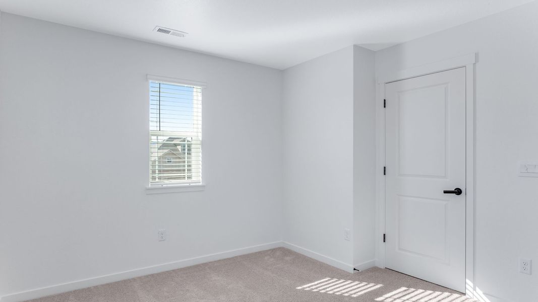 Representative unfurnished interior of a home built from the Calhan by D.R. Horton in Vantage, Berthoud (Image 29).