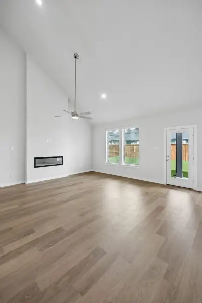 Living Room in the Winters home plan by Trophy Signature Homes – REPRESENTATIVE PHOTO