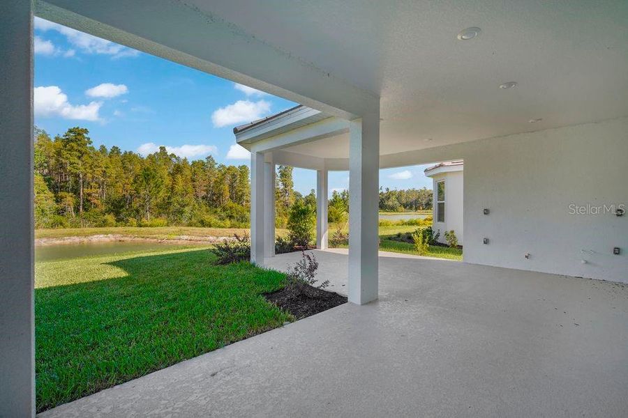 Exterior details and patio area of a home in Esplanade at Wiregrass Ranch, Wesley Chapel (Image 4).