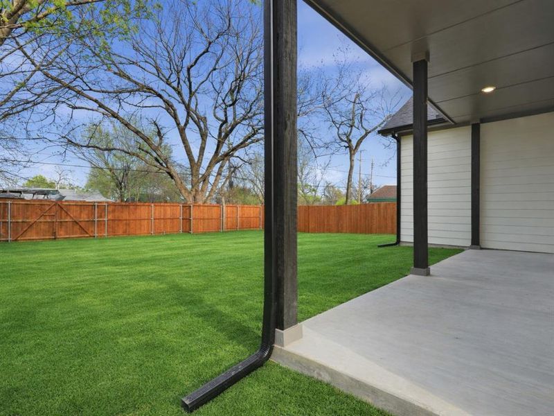 Fenced backyard featuring a patio Fenced backyard featuring a patio