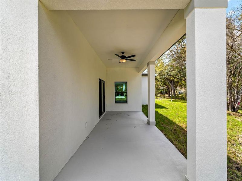 Exterior details and patio area of a home in , North Port (Image 34).