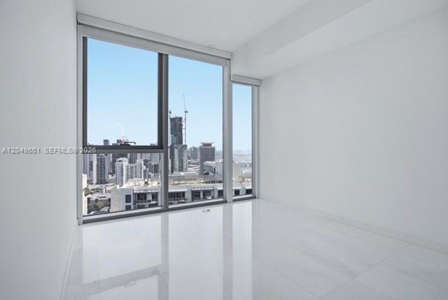 Spacious, unfurnished interior of a new home in Aston Martin Residences, Miami (Image 21).