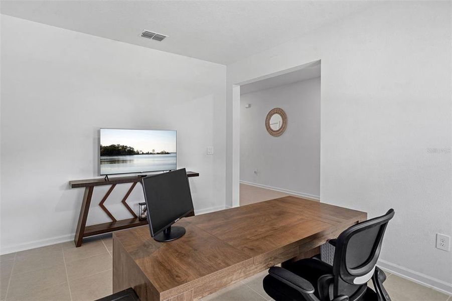 Furnished interior view inside a new home in Wellness Ridge, Clermont (Image 14).