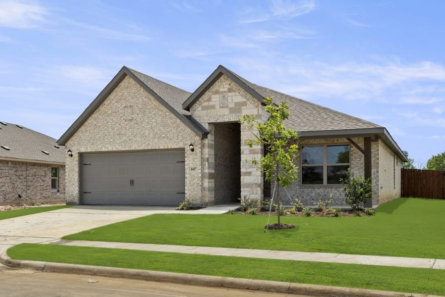 Representative exterior photo of a completed home built from the Lincoln by Impression Homes in Keeneland, Aubrey, TX (Image 2). Representative exterior photo of a completed home built from the Lincoln by Impression Homes in Keeneland, Aubrey, TX (Image 2).
