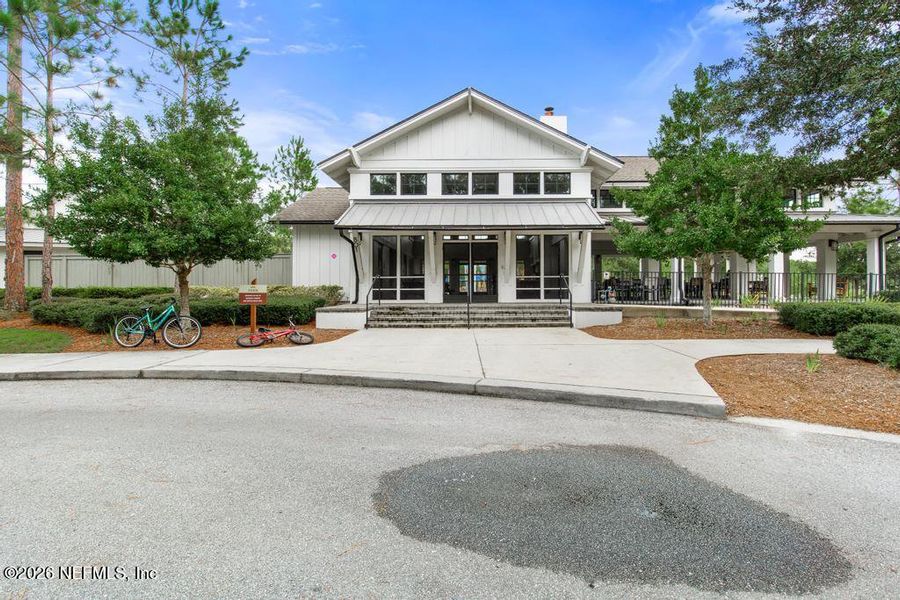 Front exterior of a new home in Trailmark, St. Augustine, FL, highlighting curb appeal (Image 25). Front exterior of a new home in Trailmark, St. Augustine, FL, highlighting curb appeal (Image 25).