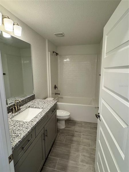 Furnished interior view inside a new home in Watercress Cove, North Port (Image 3).