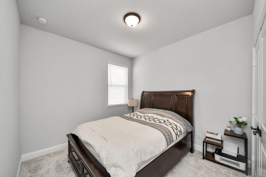 Furnished interior view inside a new home in , Conroe (Image 33).