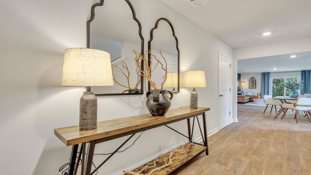 Representative furnished interior of a home built from the ROBIE by D.R. Horton in Longleaf Village, Rincon (Image 5).