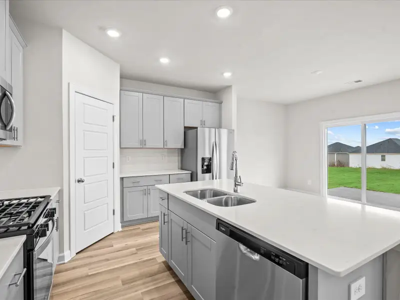 Furnished interior view inside a new home in Chatham Forest, Duncan (Image 6).