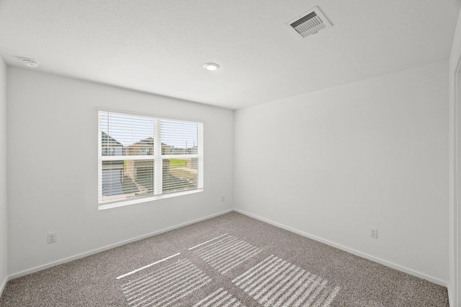 Spacious, unfurnished interior of a new home in Bridges on Lake Houston Villas, Humble (Image 17).