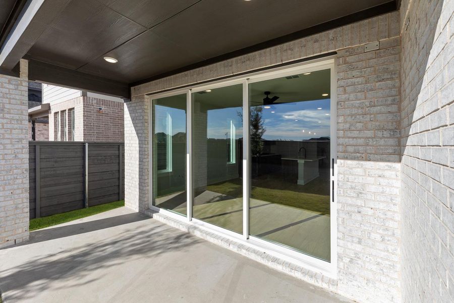 Exterior details and patio area of a home in Garden Collection at Union Park, Little Elm (Image 3). Exterior details and patio area of a home in Garden Collection at Union Park, Little Elm (Image 3).