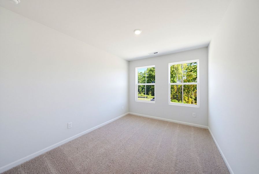 Spacious, unfurnished interior of a new home in Sweetbrier, Durham (Image 20).