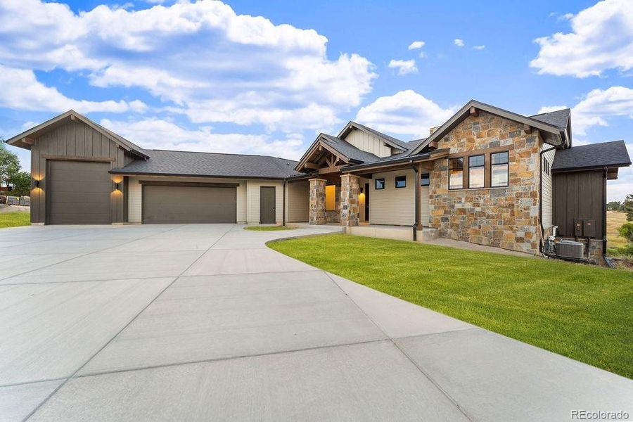 Front exterior of a new home in , Parker, CO, highlighting curb appeal (Image 1).