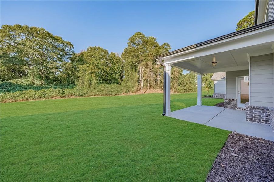 Exterior details and patio area of a home in , Buford (Image 2). Exterior details and patio area of a home in , Buford (Image 2).